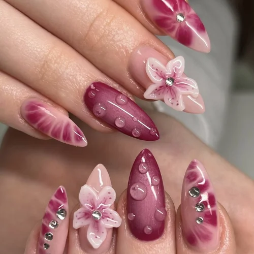 Sparkling 3D nail art with crystals and studs on elegant nails