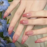 Chip-resistant high-gloss gel polish on durable nail extensions