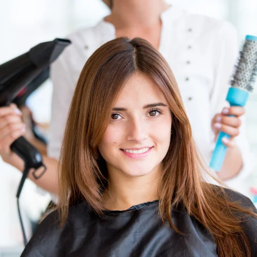 Hair-Cut-And-Blow-Dry.webp Frizz-free transformation with ladies hair straightening in Dubai.